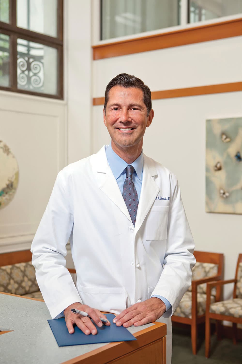 Dr. Daniel Monti, Integrative medicine doctor, pictured in white coat. A patient may be interested in integrative medicine services and clinic if they have the following interests: preventive medicine, healthy aging, prevention, whole person wellness, nutritional healing, integrative and alternative cancer therapies, holistic medicine, medical herbalism, alternative medicine, Vitamins and supplements, naturopathic doctors, complementary medicine, alternative medicine, holistic medicine, naturopathic medicine, functional medicine, mind body medicine, traditional medicine, Ayurvedic medicine, Chinese medicine, homeopathy, herbal medicine, integrative health, integrative therapy, integrative nutrition, integrative oncology, integrative psychiatry, integrative cardiology, integrative pediatrics, integrative gastroenterology, leaky gut, acupuncture, disease, meditation, complementary therapies, massage therapy, psychotherapy, holistic health, herbal medicine, preventive medicine, integrative primary care, alternatives to traditional primary care, alternative treatment of illness and cognitive decline.